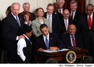 President Obama Signs The Affordable Care Act Into Law
